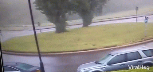 Car Crashing Roundabout Viralhog GIF