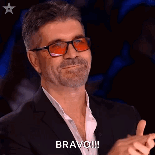 Clapping Simon Cowell GIF