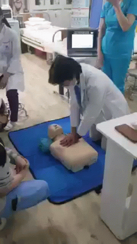 Doctor Slap Dummy While Doing Cpr GIF