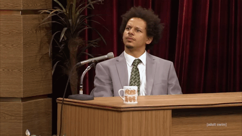 Eric Andre Shrug GIF
