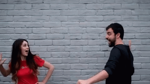 Evan And Katelyn Extreme High Five GIF