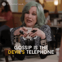Gossiping Moira Rose GIF