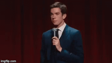 John Mulaney Giggling GIF