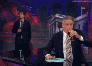 John Oliver And John Stewart Spit-take GIF