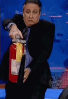 Jon Stewart Extinguish GIF