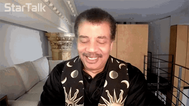 Laughing Neil De Grasse Tyson GIF
