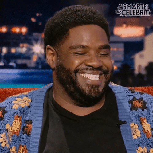 Laughing Ron Funches GIF