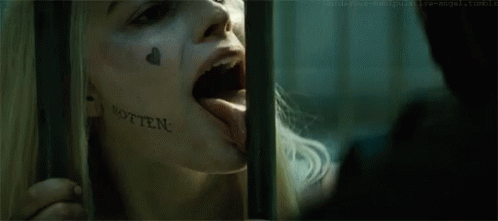 Licks The Bars Harley Quinn GIF