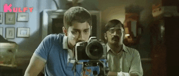 Looking Into Camera.Gif GIF