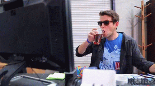 Multitasking Drinking GIF