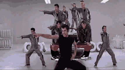 Pointing Grease GIF