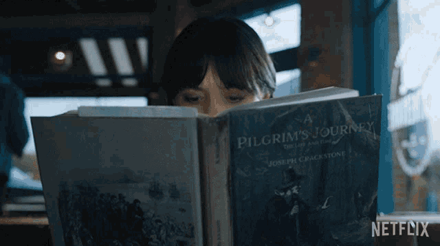 Reading A Book Wednesday Addams GIF