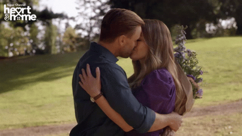 Riverfront Romance Kiss GIF