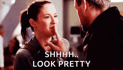 Shh Smiling GIF
