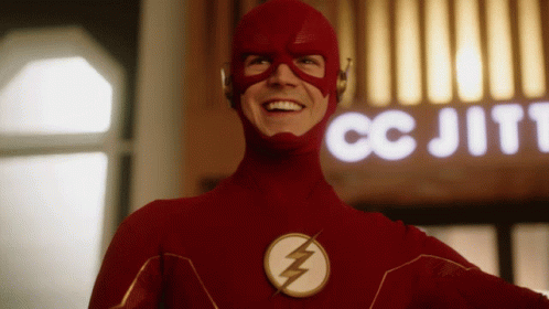 Smiling Grant Gustin GIF