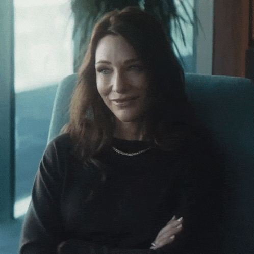 Smirking Black Bag GIF