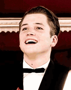 Taron Laugh GIF