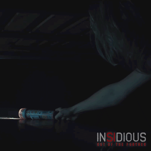 Trying To Reach The Flashlight Amelia Eve GIF