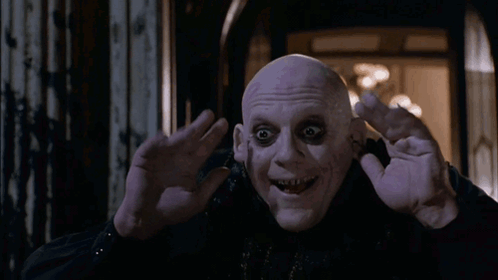 Uncle Fester Addams Family GIF