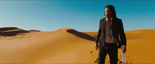 Walking Keanu Reeves GIF
