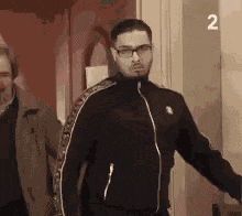 Angry Man With Glasses Walking Into Court Room GIF