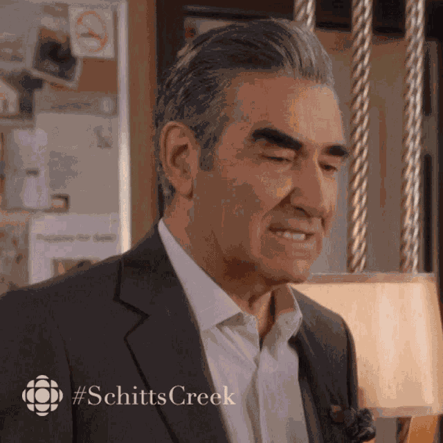 Awkward Smile Johnny Rose GIF