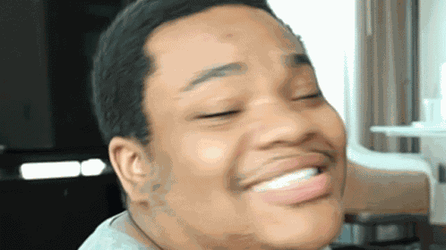 Awkward Smile Mac Kahey GIF