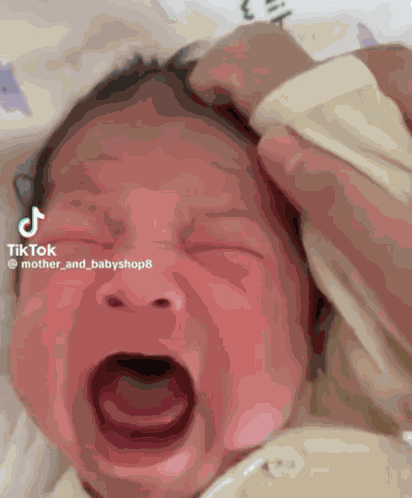Baby Pulling Own Hair GIF