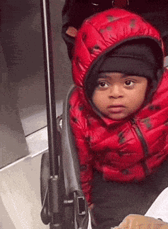Black Baby Trying Not To Laugh GIF