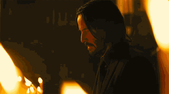 Blowing Out Candle John Wick GIF