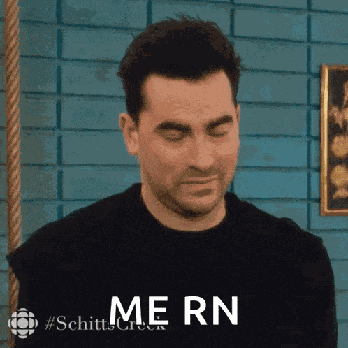 Bored Dan Levy GIF