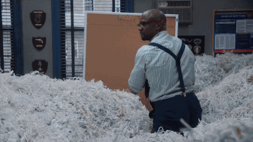 Brooklyn99 Papers GIF