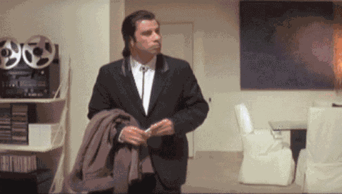 Confused John Travolta GIF