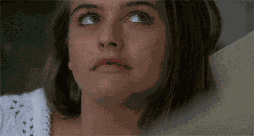 Coy Alicia Silverstone GIF