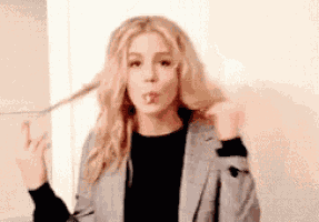 Coy Emily Bett Rickards GIF
