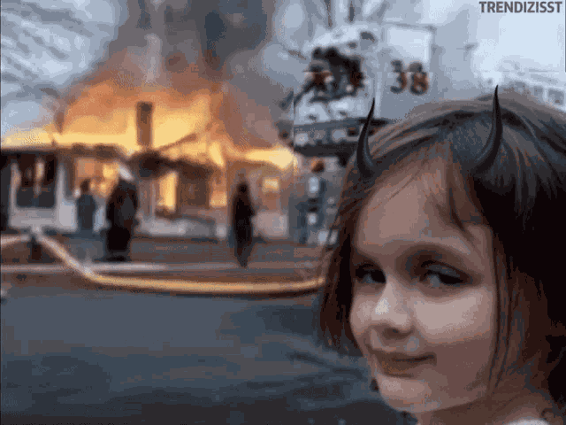Disaster Girl Burning GIF