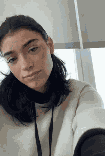 Dixie Damelio Shaking Head GIF