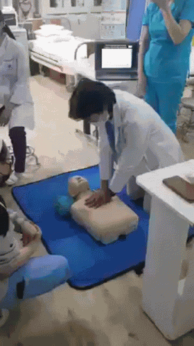 Doctor Slap Dummy While Doing Cpr GIF