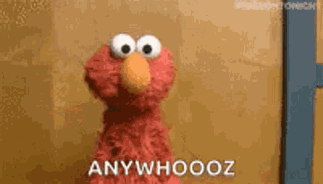 Elmo Shrug GIF