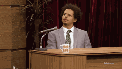 Eric Andre Shrug GIF