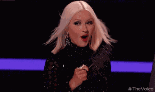 Fanning Christina Aguilera GIF