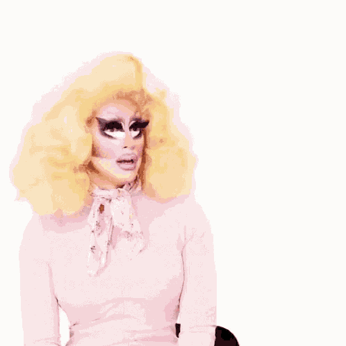 Girl With Lots Of Make Up Pointing GIF