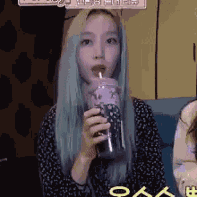Gowon Loona Drinking Something Unbothered Not Paying Attention Not Saying A Word Quiet GIF