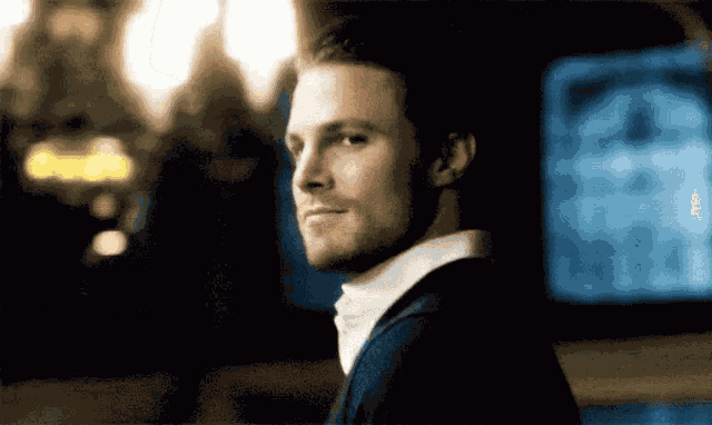 Green Arrow Wink GIF