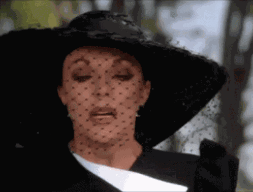 Joan Collins GIF