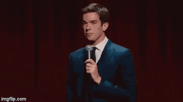 John Mulaney Giggling GIF