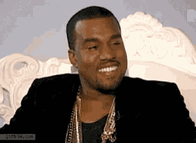 Kanye Laughing GIF