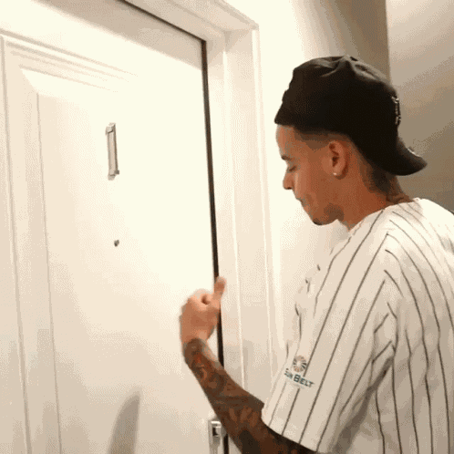 Knocking The Door Rhino GIF