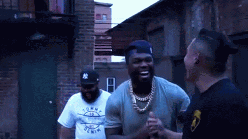 Laughing 50cent GIF
