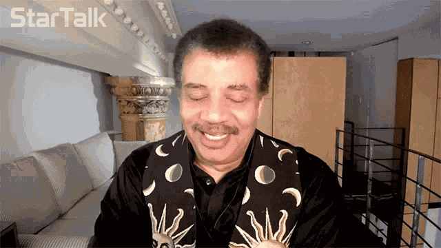 Laughing Neil De Grasse Tyson GIF